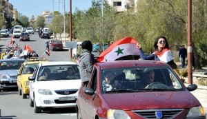 Syrians launch pro-government rallies in different cities