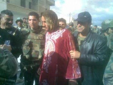 Ahrar-Al-Sham-brigade-commander-former-FSA-dressed-like-a-woman-in-order-to-escape-through-a-checkpoint
