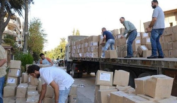 Syrian Government Humanitarian Aid Distributed among Families in Aleppo