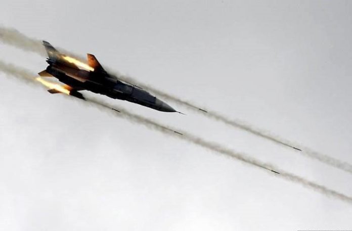 Syrian-Airforce-Strikes-Ar-Raqqah-696x457