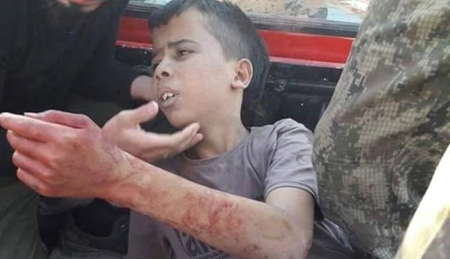 SHOCKING PICS: West Backed Syrian Moderate Rebels Beheads a Child