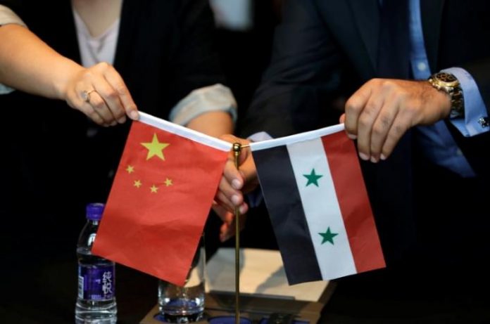 Syria-Chinese-flags-696x461