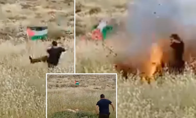 WATCH: Zionist attempting to remove Palestinian flag got instant respond with explosive trap