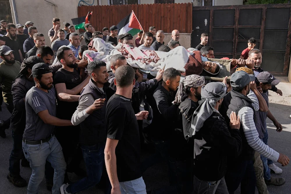 IOF kill Palestinian teen, settlers loot a flock of sheep in West Bank