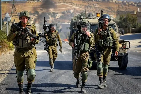 Zionist regime forces raid multiple West Bank towns overnight