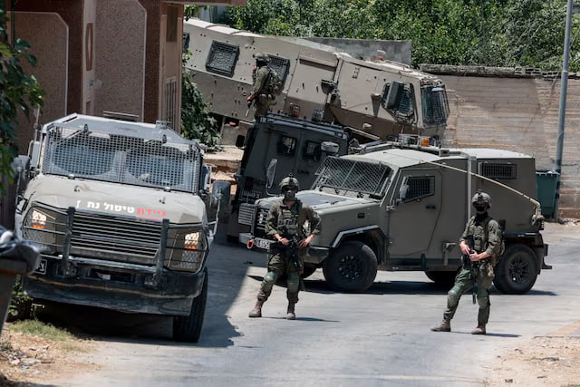 Settler Attacks Intensify as Israeli Forces Arrest Dozens in West Bank