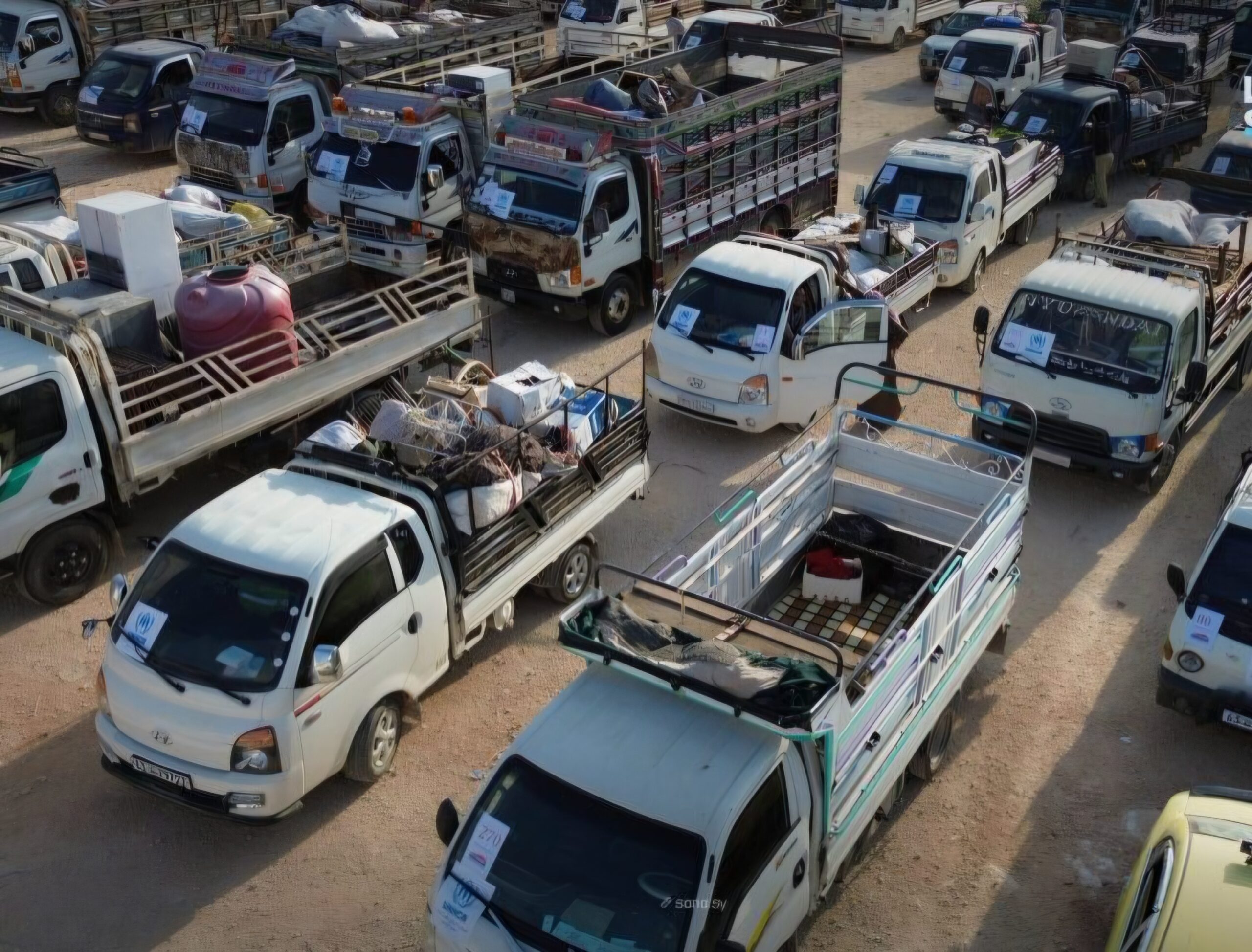 220 displaced families leave Idlib camps to return home across eight Syrian provinces