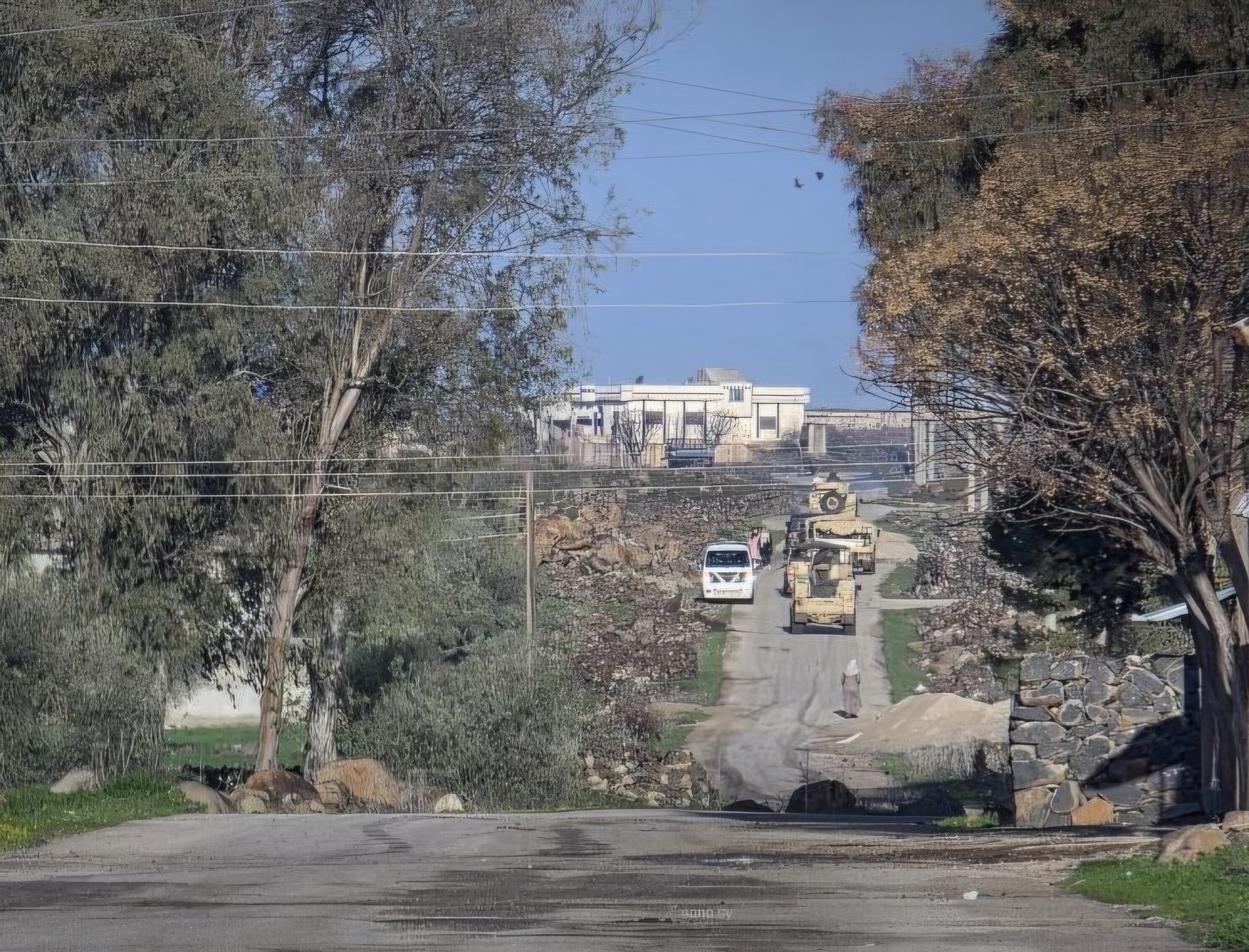 Israeli occupation forces set fire to warehouse and home in Daraa countryside