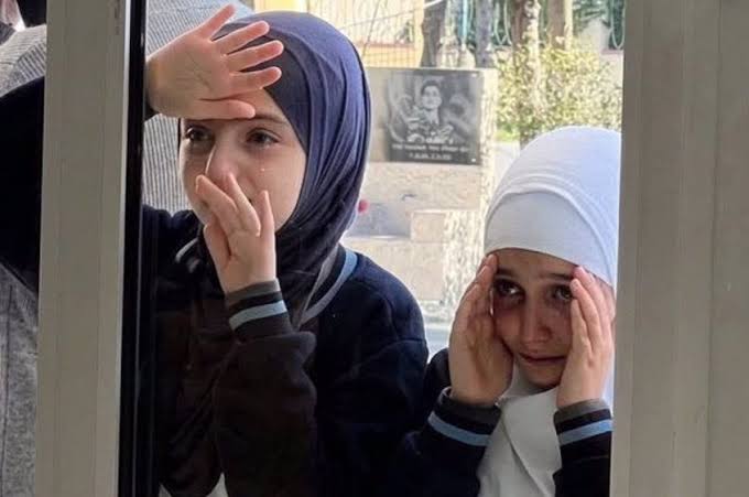 Azerbaijani girls crying out for help after being denied entry to school because of their Hijabs: